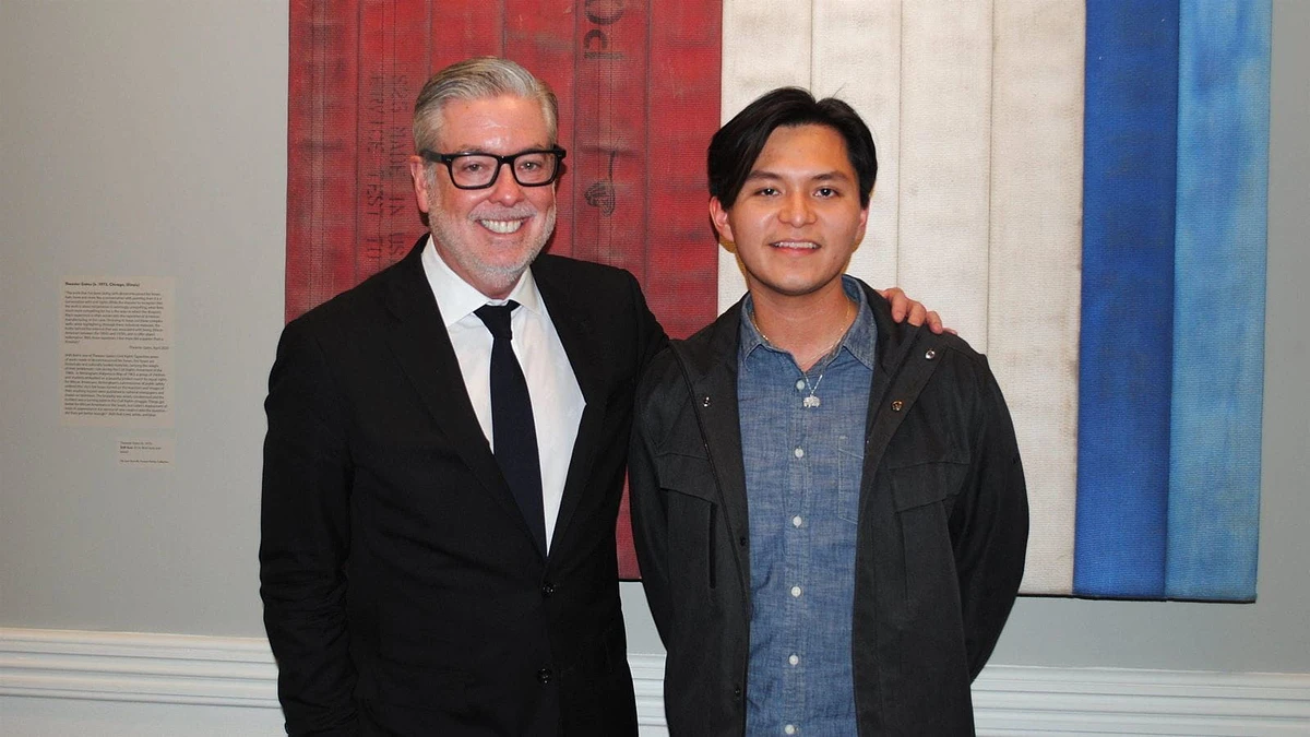 President John Fry stands with Sky Harper